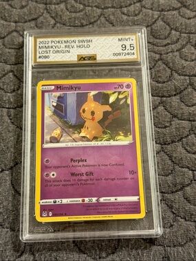 Pokemon Mimikyu Reverse Holo Card - Purple/Yellow